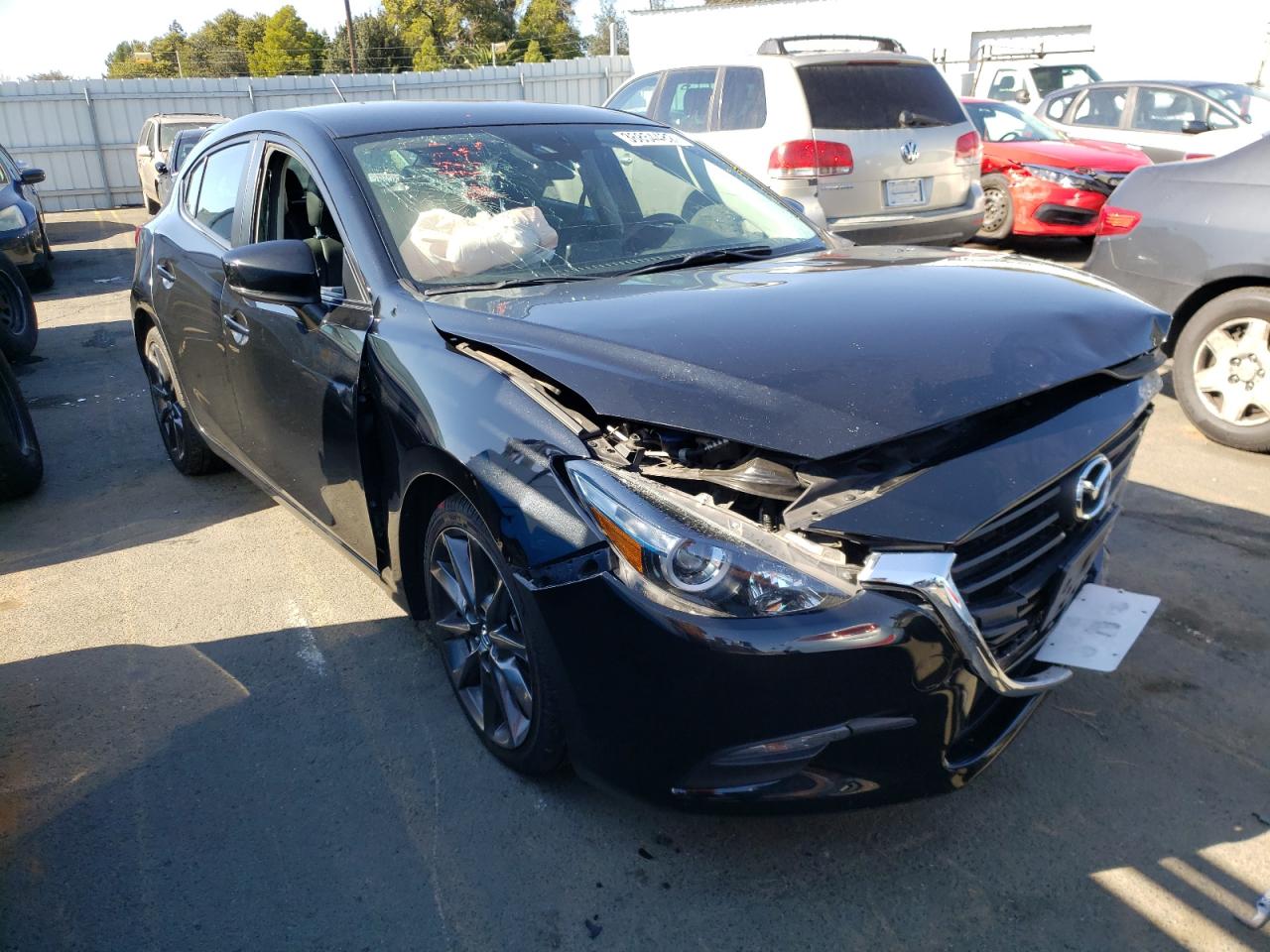 MAZDA 3 TOURING 2018 with VIN 3MZBN1L36JM272215 - Photo from auction