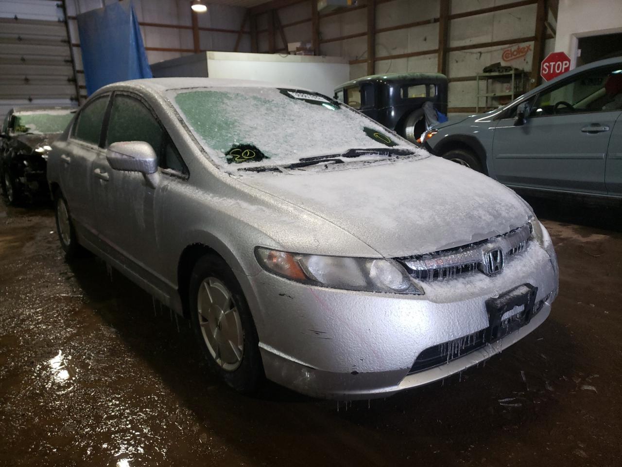 HONDA CIVIC HYBR 2008 with VIN JHMFA36228S025563 - Photo from auction