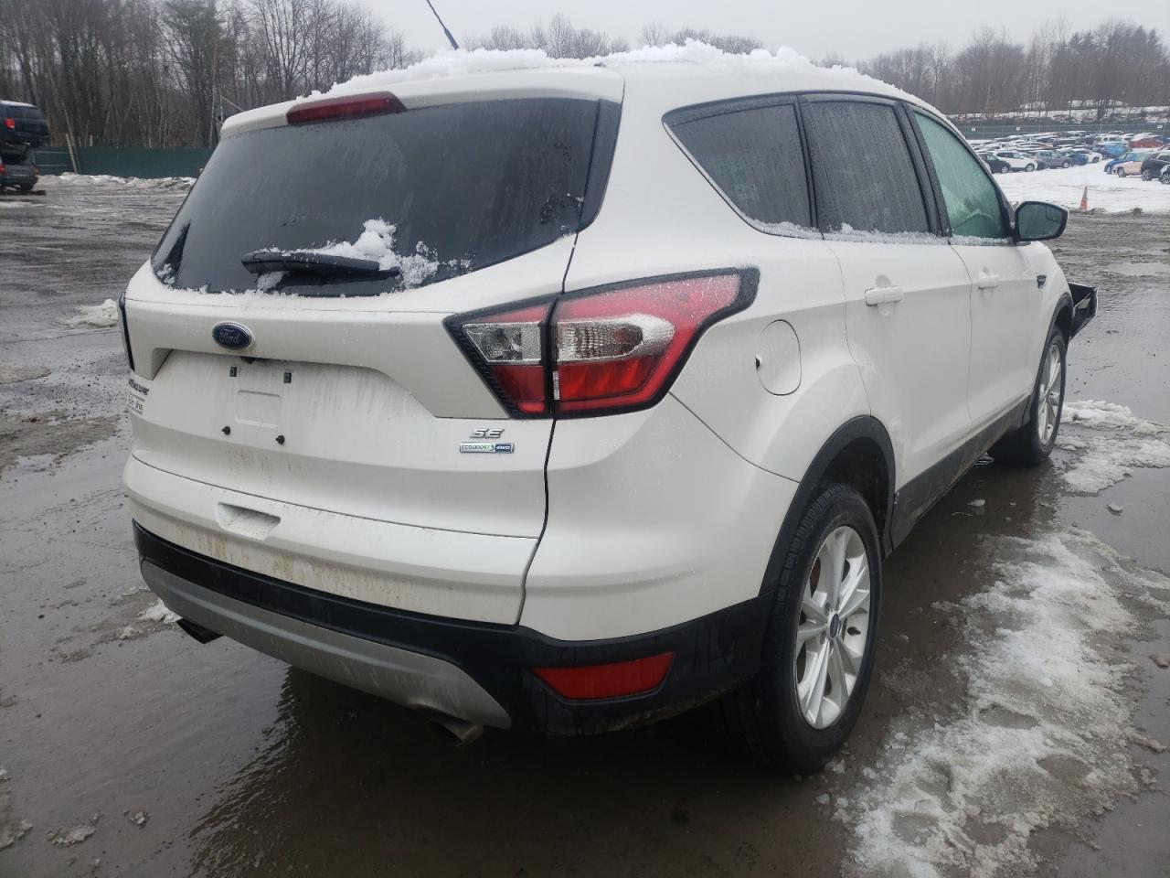 Photo 4 from auction – 2017 FORD ESCAPE SE with VIN 1FMCU9G96HUD99667