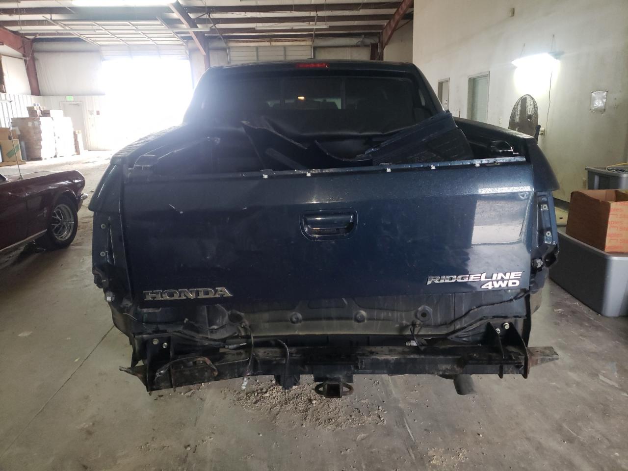 Photo 9 from auction – 2010 HONDA RIDGELINE with VIN 5FPYK1F58AB002708