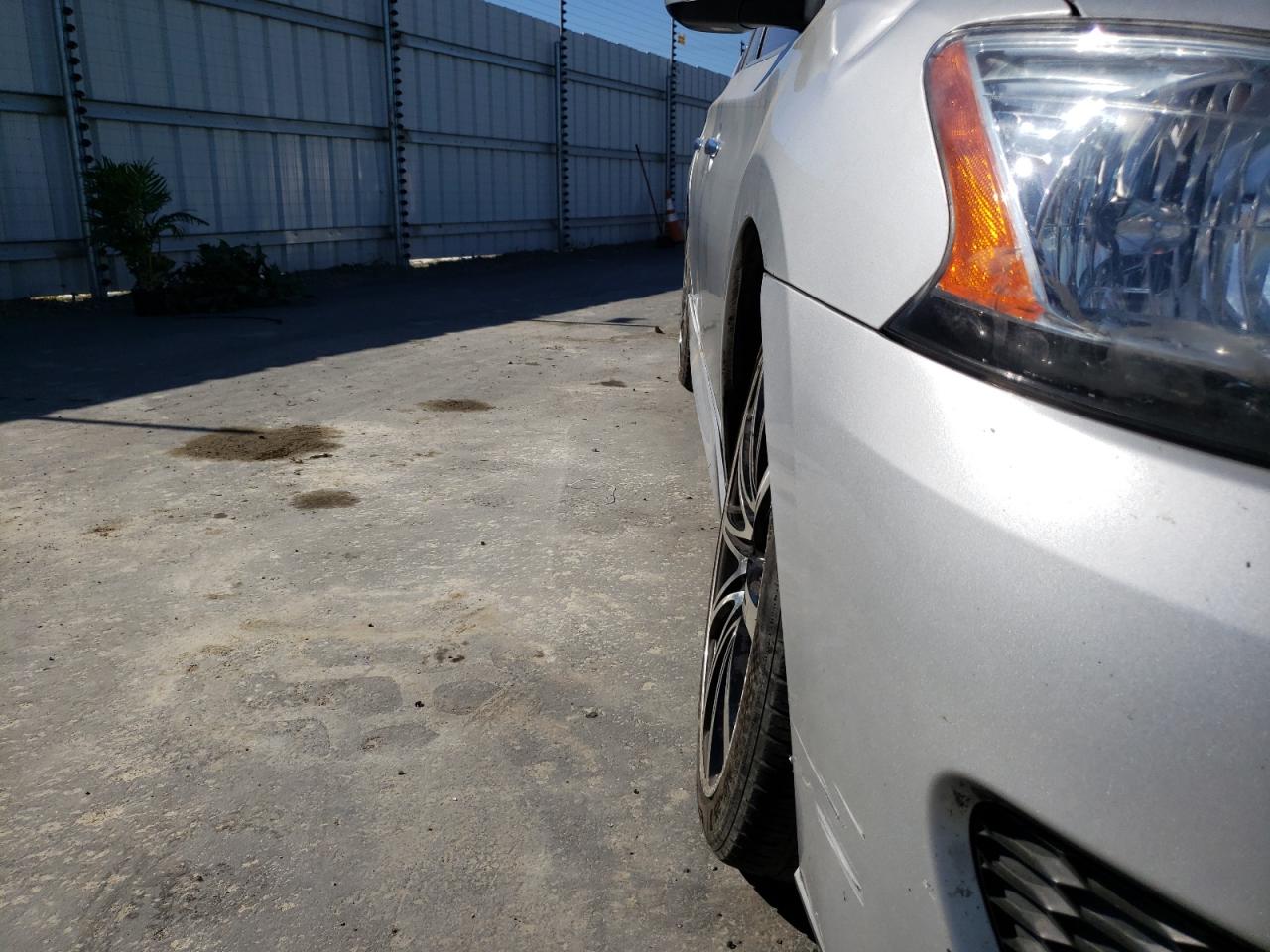 Photo 9 from auction – 2014 NISSAN SENTRA S with VIN 3N1AB7AP9EY325099