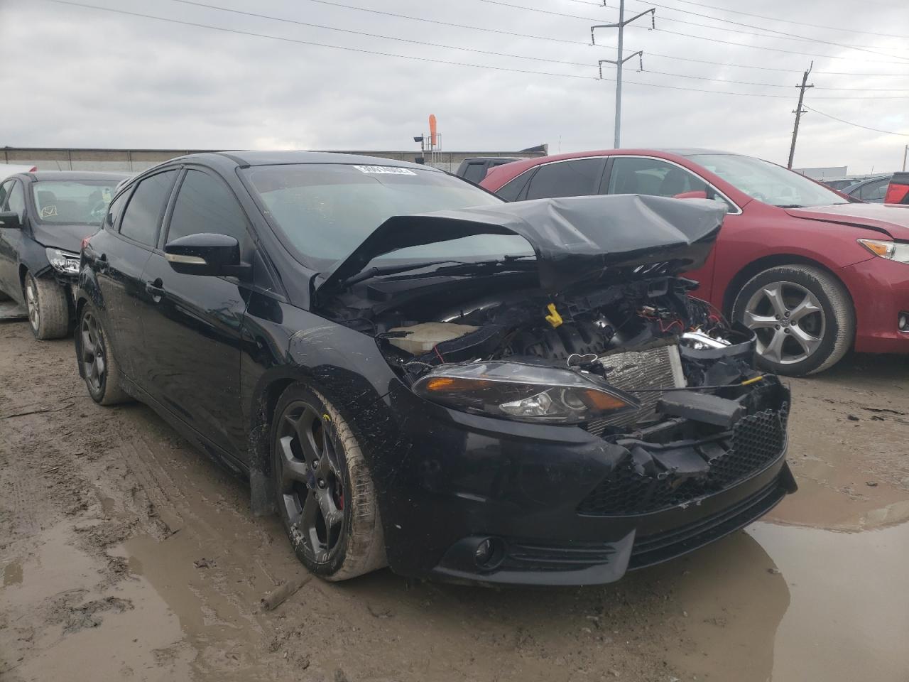 FORD FOCUS ST 2014 with VIN 1FADP3L92EL122444 - Photo from auction