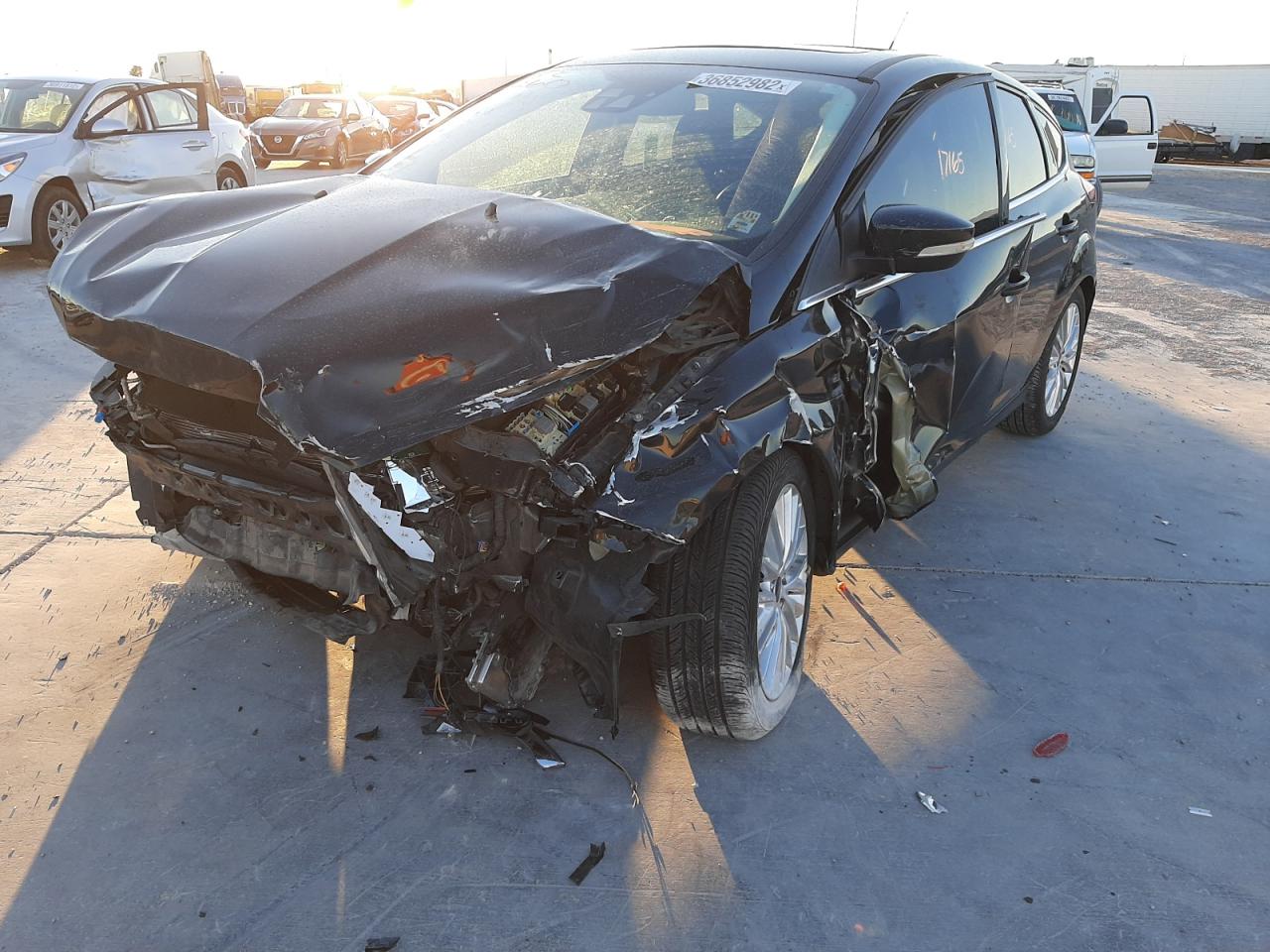 Photo 2 from auction – 2017 FORD FOCUS TITA with VIN 1FADP3N29HL314609