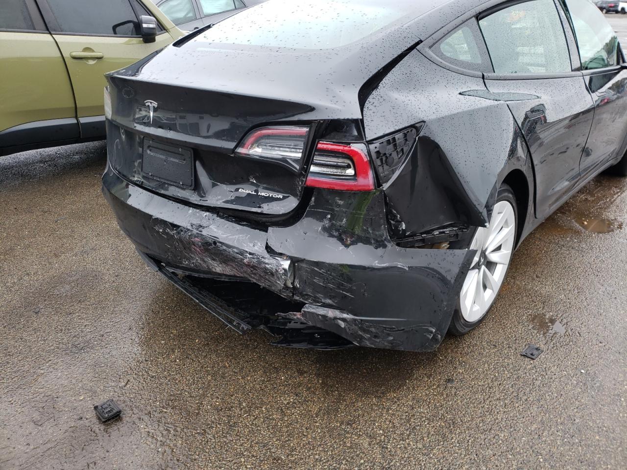 Photo 9 from auction – 2021 TESLA MODEL 3 with VIN 5YJ3E1EB9MF974999