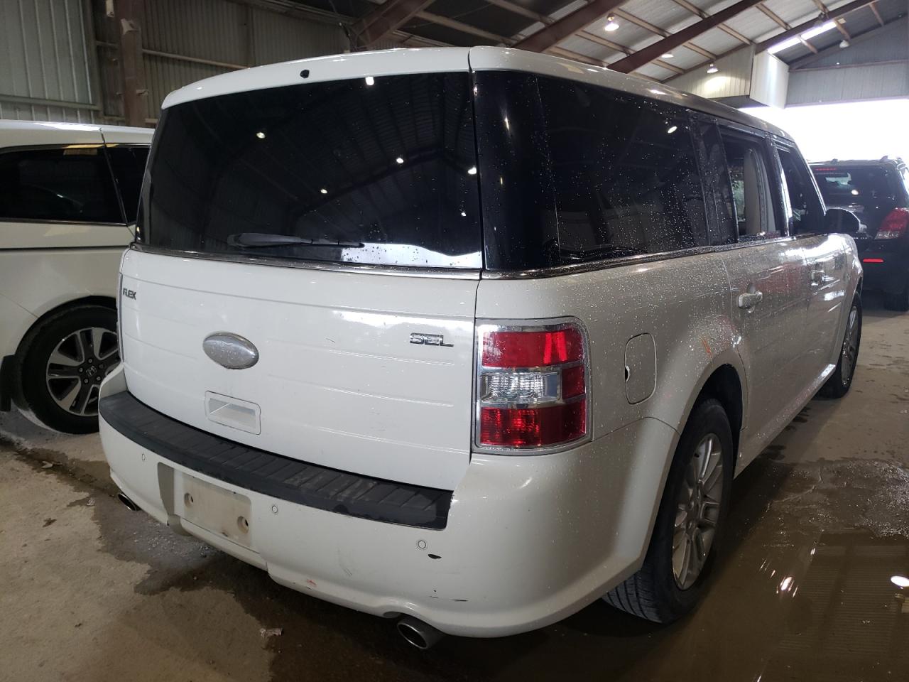 Photo 4 from auction – 2013 FORD FLEX SEL with VIN 2FMGK5C88DBD04099