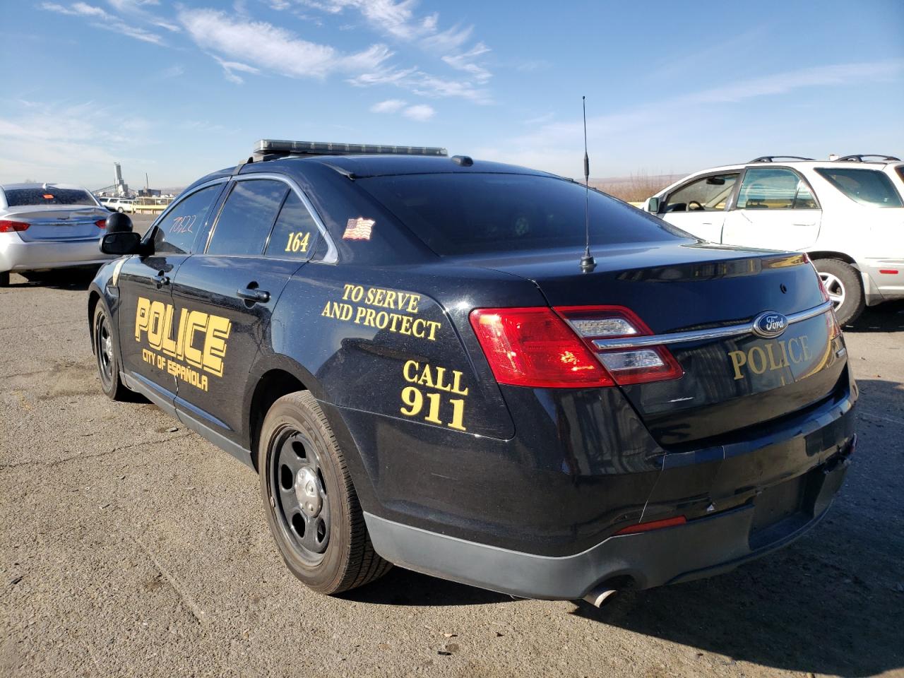 Photo 3 from auction – 2015 FORD TAURUS POL with VIN 1FAHP2MK7FG182050