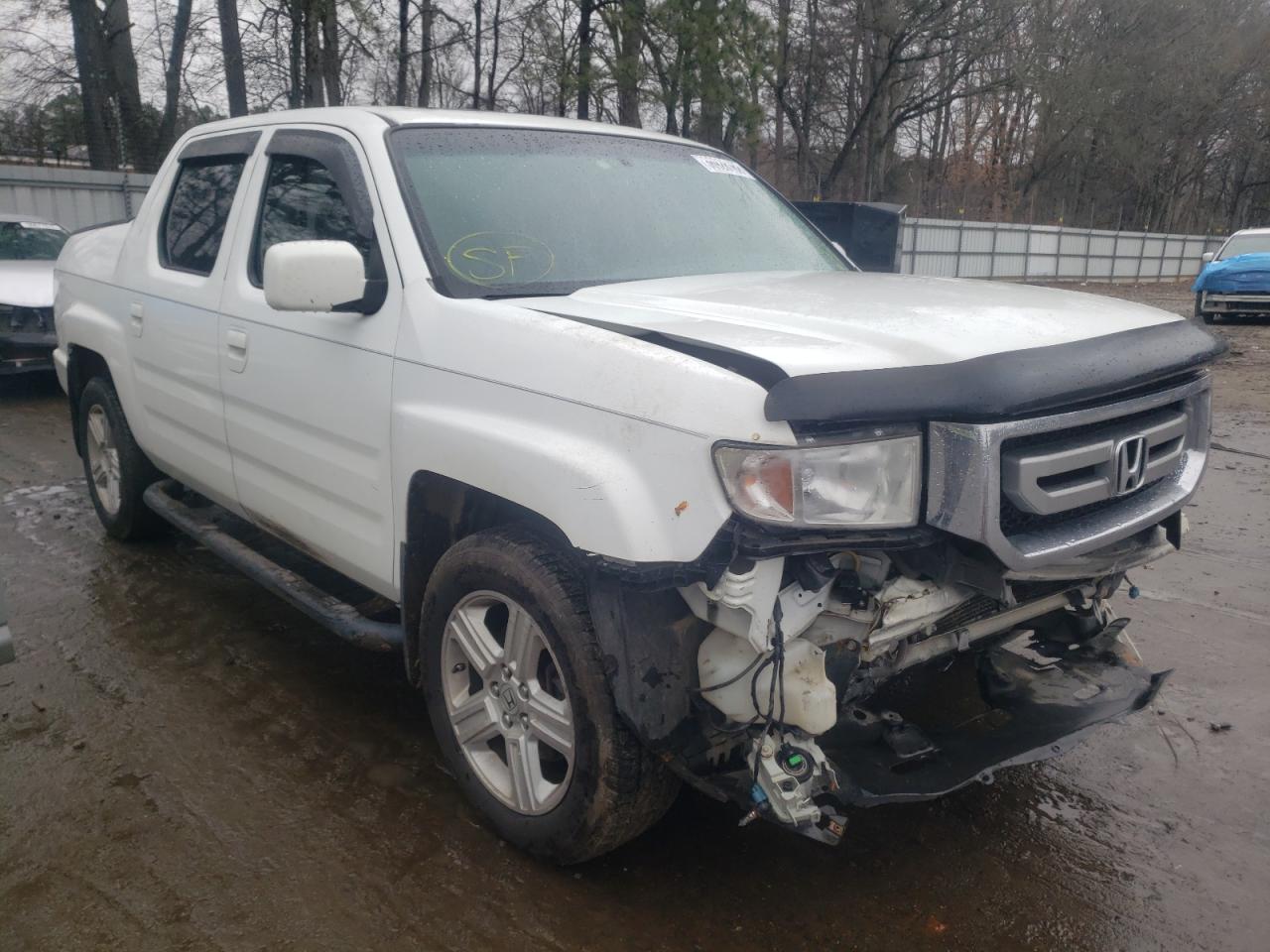 HONDA RIDGELINE 2011 with VIN 5FPYK1F53BB006148 - Photo from auction