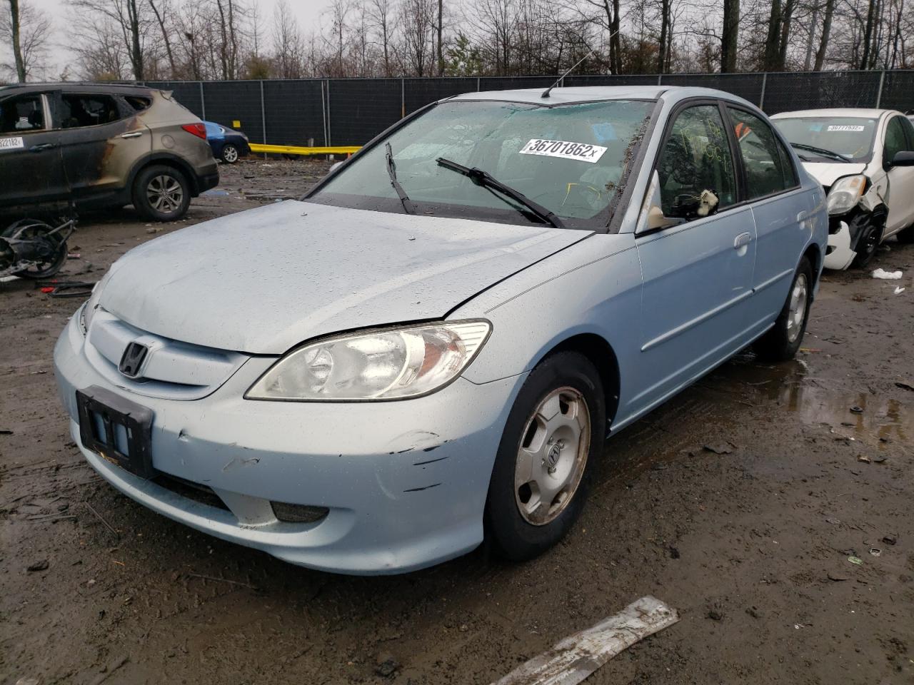 Photo 2 from auction – 2004 HONDA CIVIC HYBR with VIN JHMES96604S014795