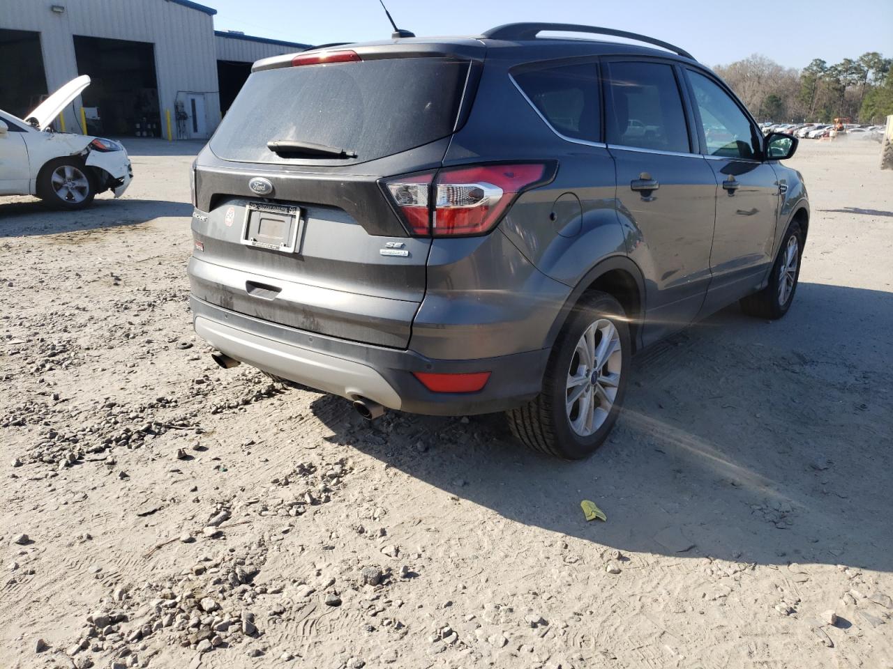 Photo 4 from auction – 2017 FORD ESCAPE SE with VIN 1FMCU0GD9HUD73497