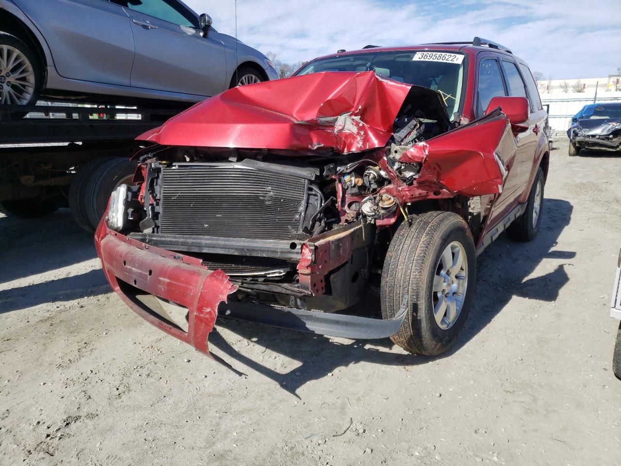 Photo 2 from auction – 2012 FORD ESCAPE LIM with VIN 1FMCU0EG8CKC36455