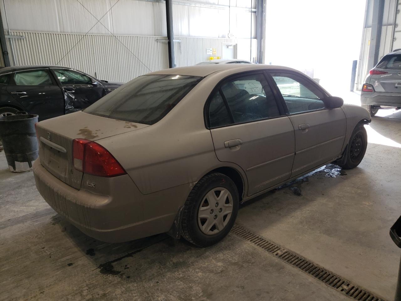 Photo 4 from auction – 2003 HONDA CIVIC LX with VIN 2HGES16573H550287
