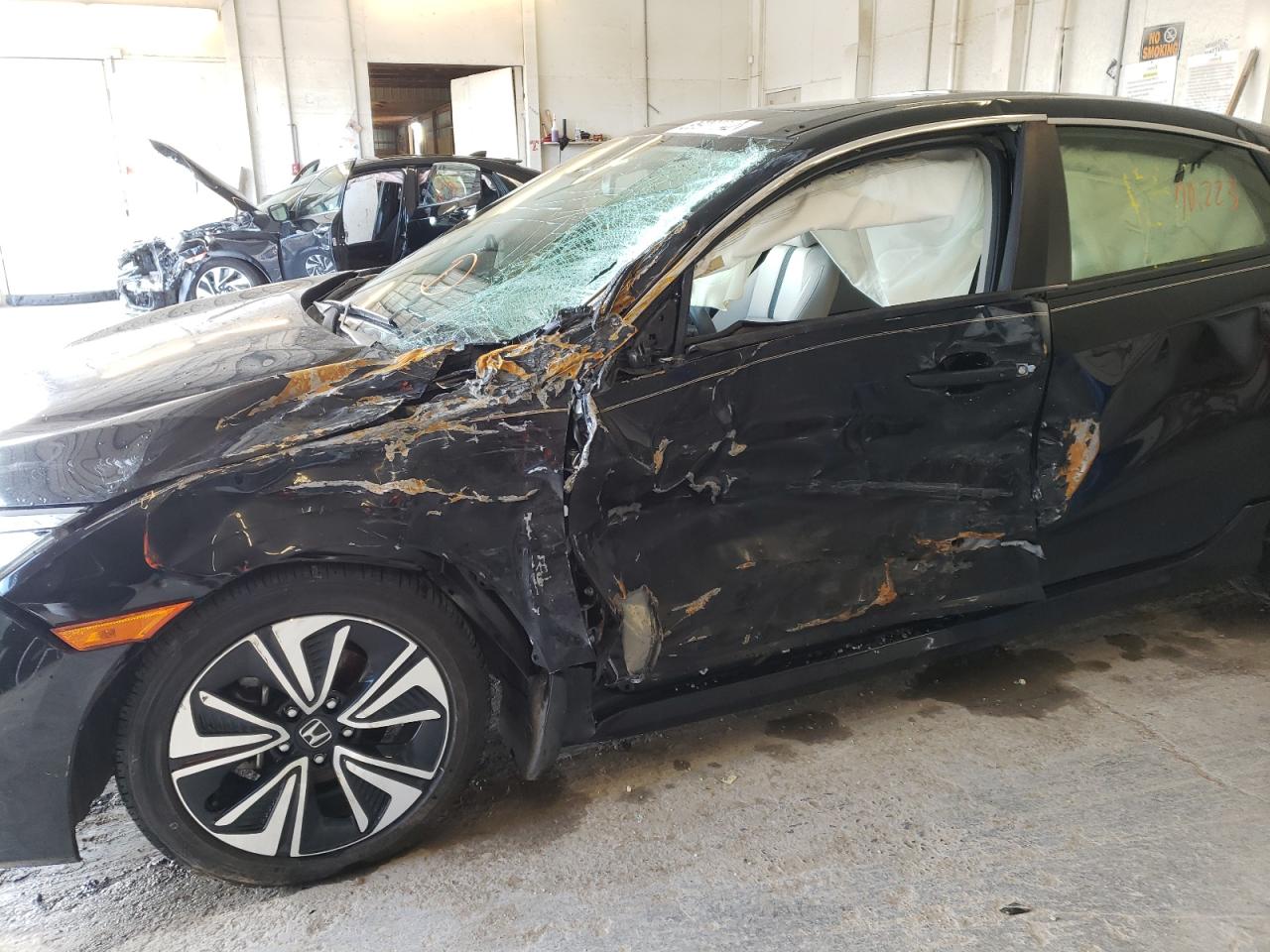Photo 9 from auction – 2018 HONDA CIVIC EX with VIN JHMFC1F38JX002563