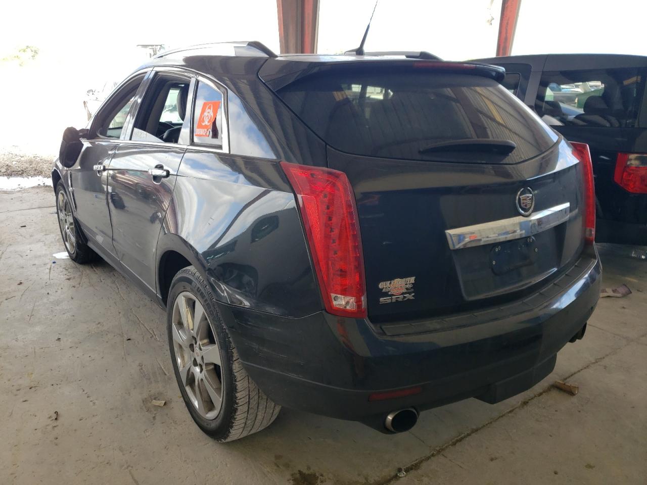 Photo 3 from auction – 2011 CADILLAC SRX PREMIU with VIN 3GYFNCEY7BS600743