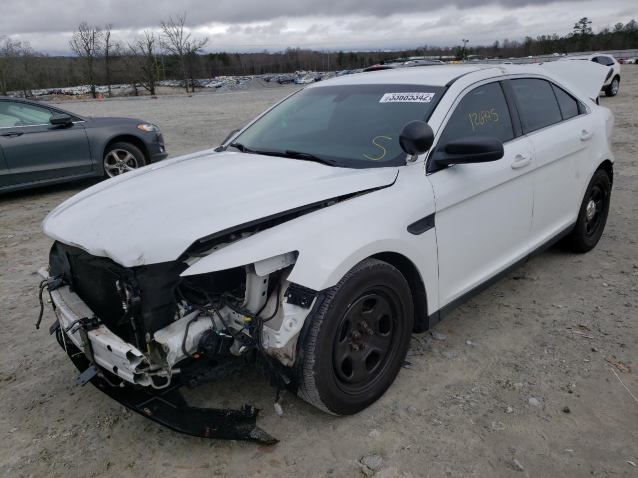 Photo 2 from auction – 2015 FORD TAURUS POL with VIN 1FAHP2MT5FG115049