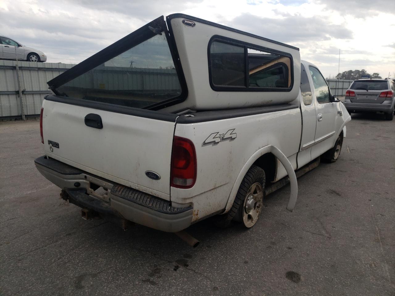 Photo 4 from auction – 2003 FORD F150 with VIN 2FTRX18L93CA02544