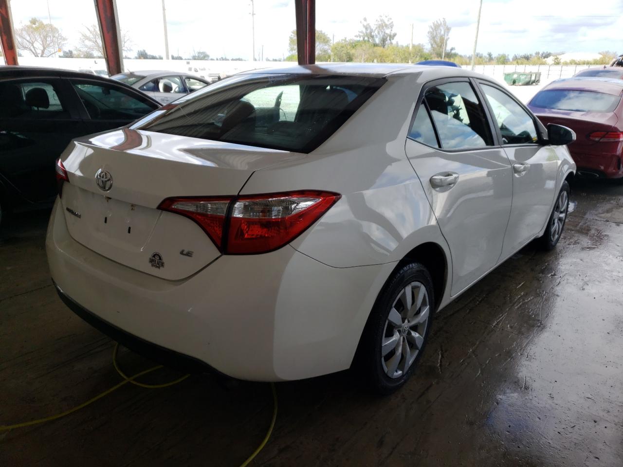 Photo 4 from auction – 2014 TOYOTA COROLLA L with VIN 5YFBURHE7EP052482