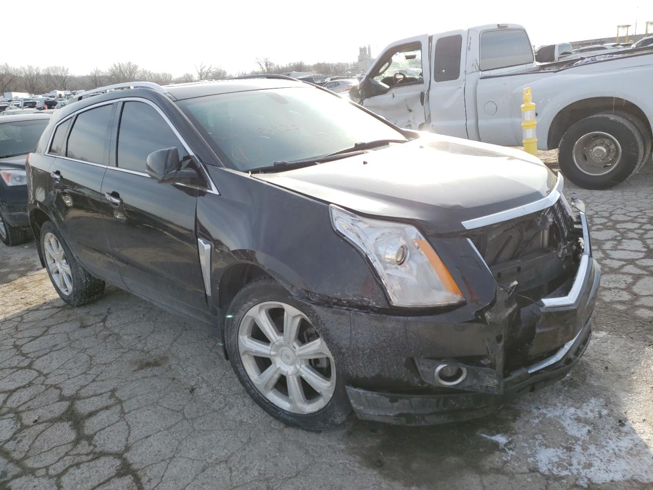 CADILLAC SRX PERFOR 2013 with VIN 3GYFNDE34DS635933 - Photo from auction
