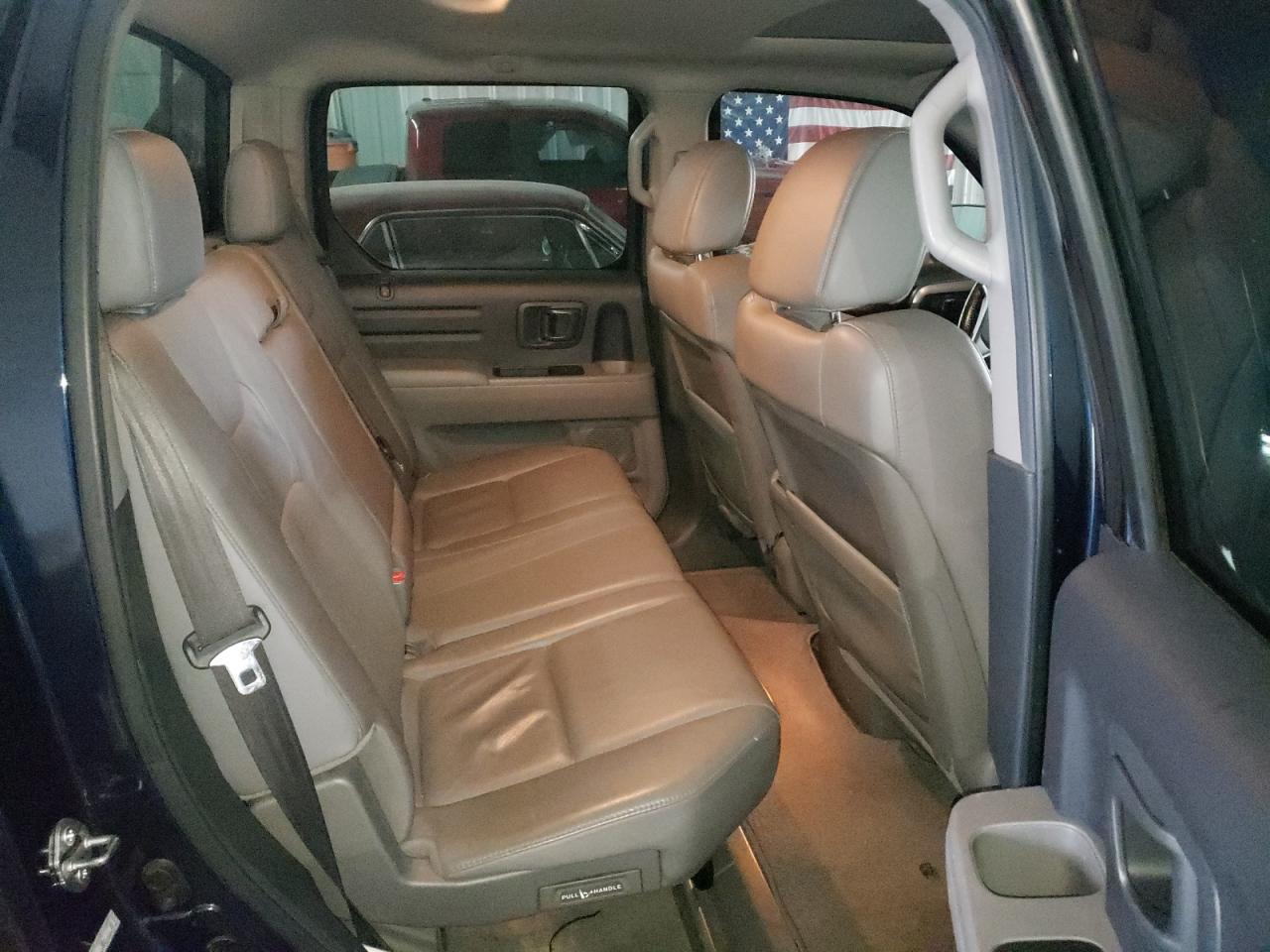 Photo 6 from auction – 2010 HONDA RIDGELINE with VIN 5FPYK1F58AB002708