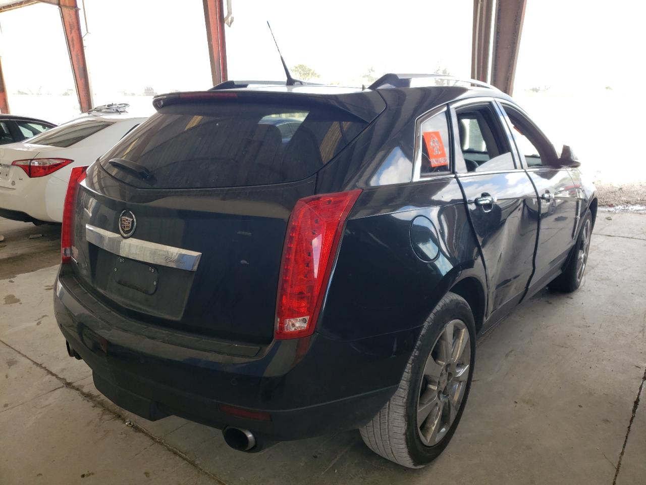 Photo 4 from auction – 2011 CADILLAC SRX PREMIU with VIN 3GYFNCEY7BS600743