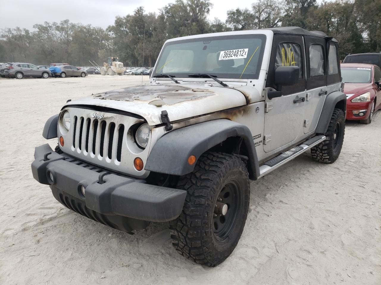 Photo 2 from auction – 2011 JEEP WRANGLER U with VIN 1J4BA3H10BL563758