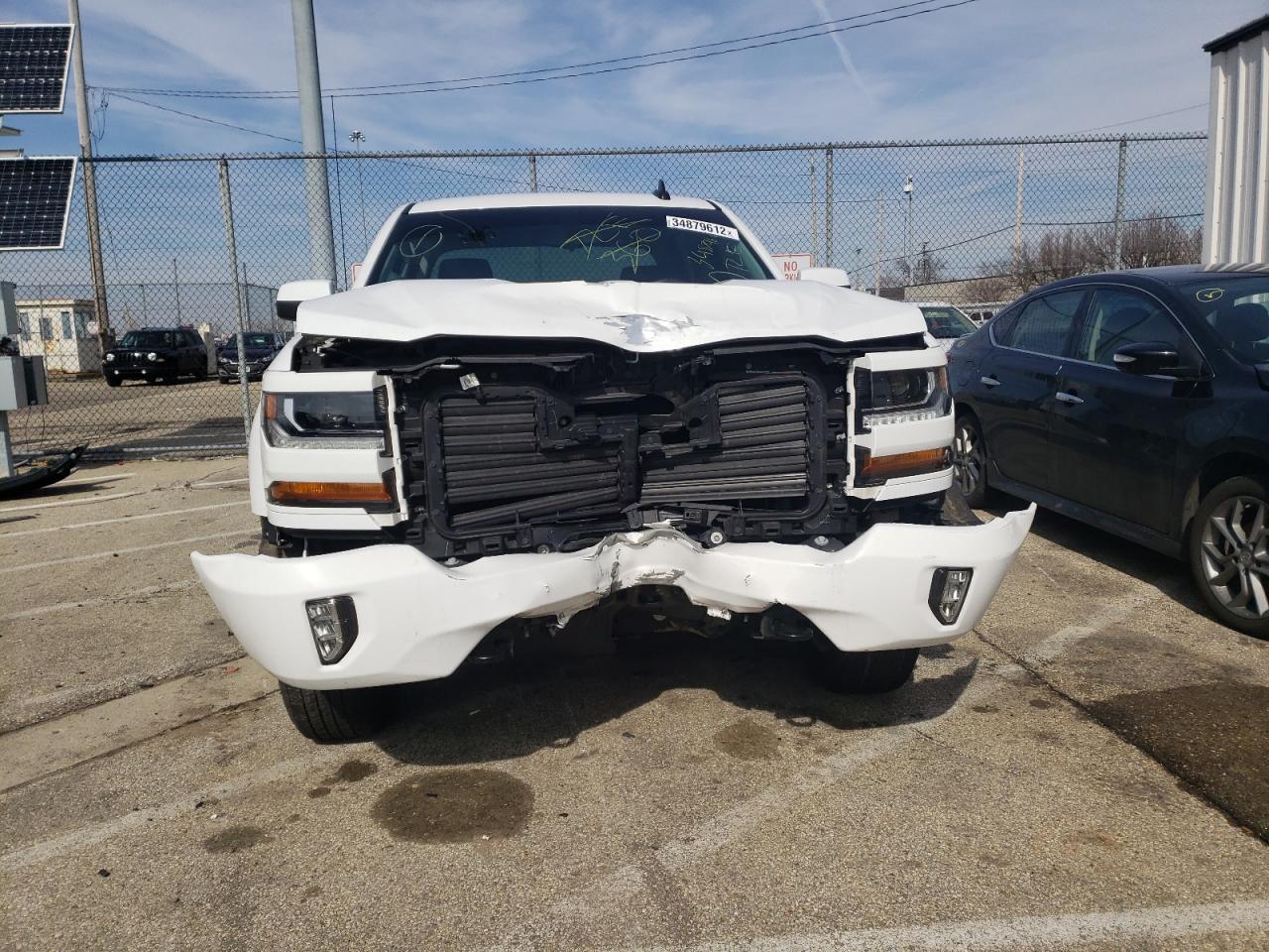 Photo 9 from auction – 2018 CHEVROLET SILVERADO with VIN 3GCUKREC0JG354083