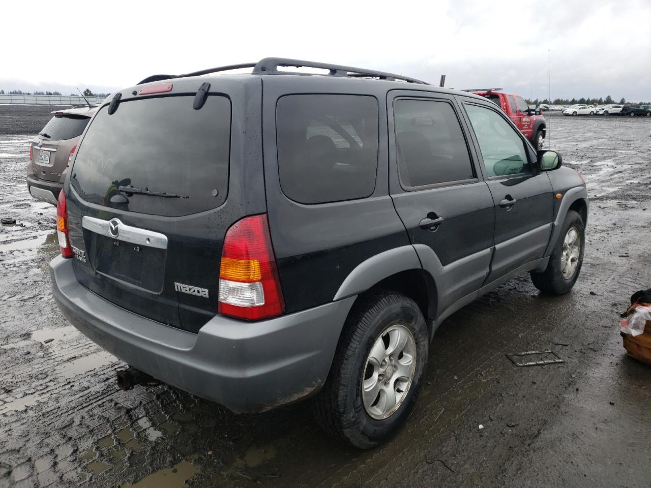 Photo 4 from auction – 2002 MAZDA TRIBUTE LX with VIN 4F2YU08132KM58384