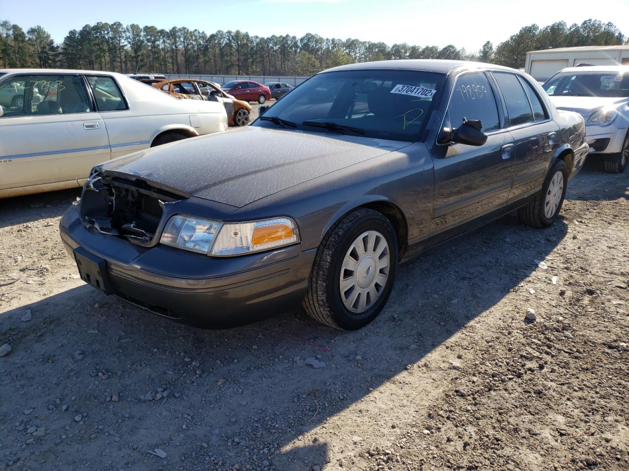 Photo 2 from auction – 2011 FORD CROWN VICT with VIN 2FABP7BV7BX183221
