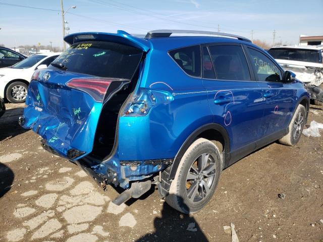 Photo 4 from auction – 2016 TOYOTA RAV4 XLE with VIN JTMWFREV9GJ076418