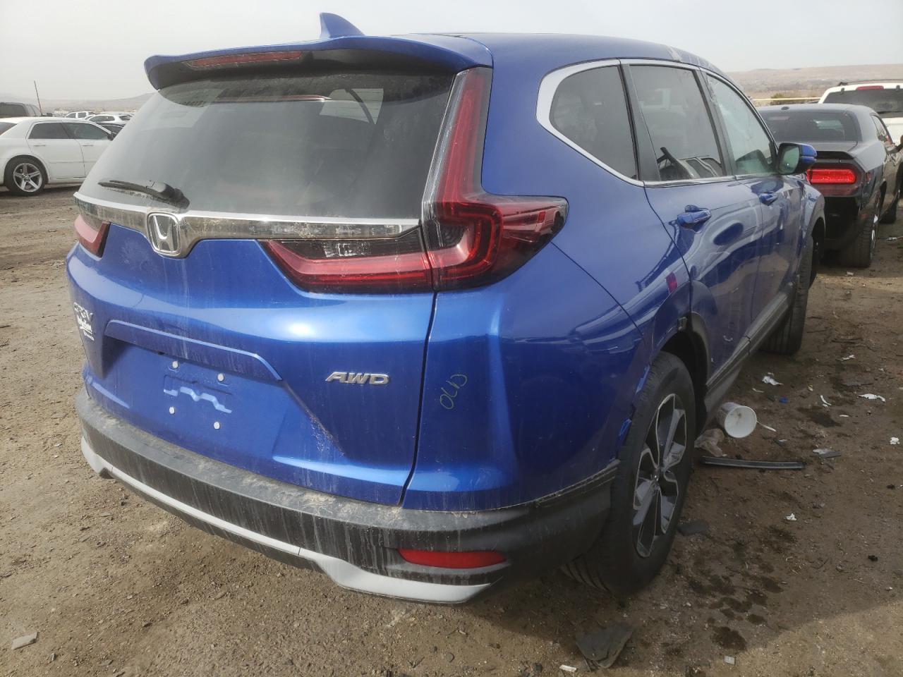 Photo 16 from auction – 2021 HONDA CR-V EX with VIN 7FARW2H53ME010213