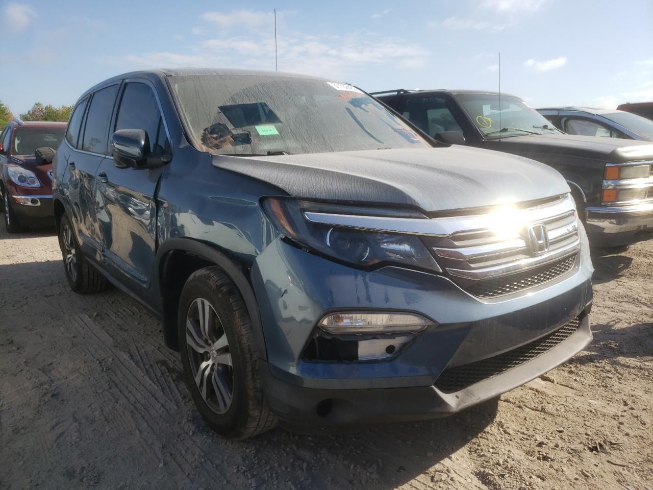 HONDA PILOT EXL 2016 with VIN 5FNYF5H54GB055240 - Photo from auction