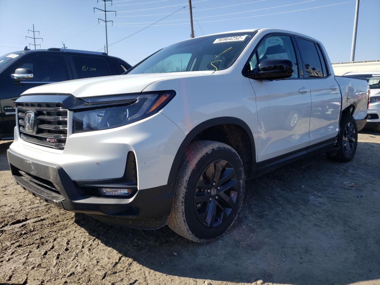Photo 2 from auction – 2021 HONDA RIDGELINE with VIN 5FPYK3F1XMB026585
