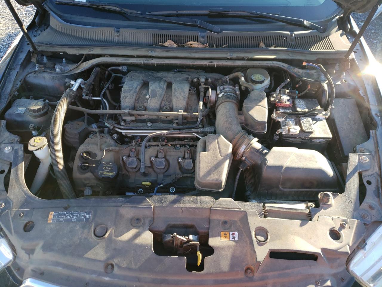 Photo 7 from auction – 2014 FORD TAURUS SEL with VIN 1FAHP2E83EG130528