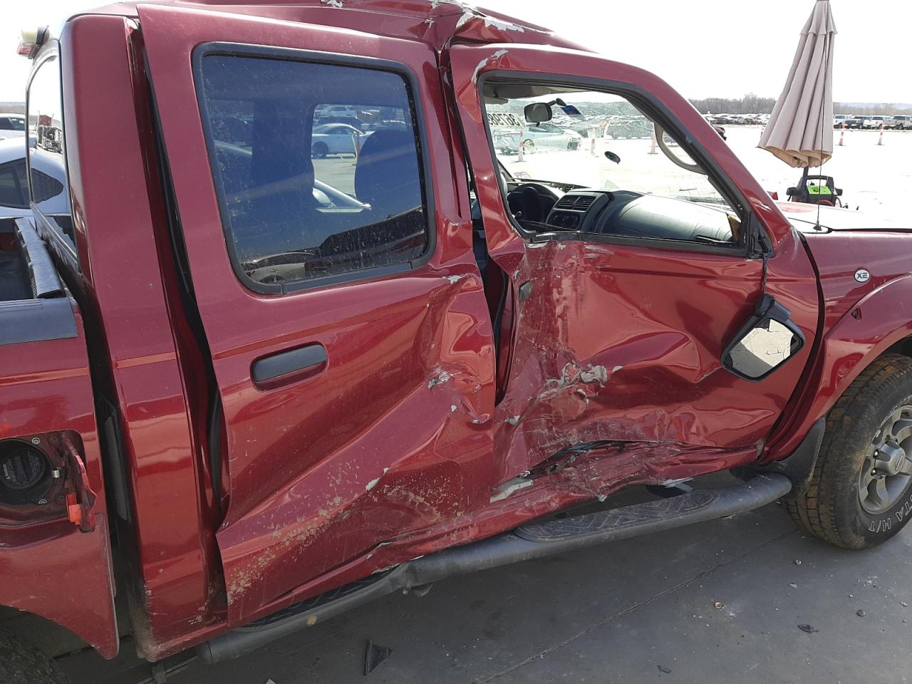 Photo 9 from auction – 2004 NISSAN FRONTIER C with VIN 1N6ED27T74C419793