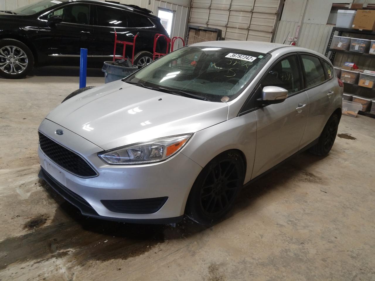 Photo 2 from auction – 2016 FORD FOCUS SE with VIN 1FADP3K24GL392198