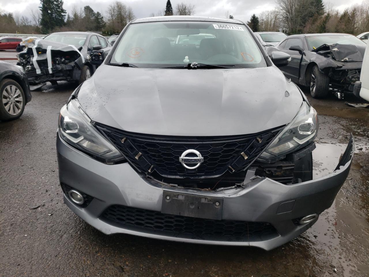 Photo 9 from auction – 2016 NISSAN SENTRA S with VIN 3N1AB7AP1GY275267