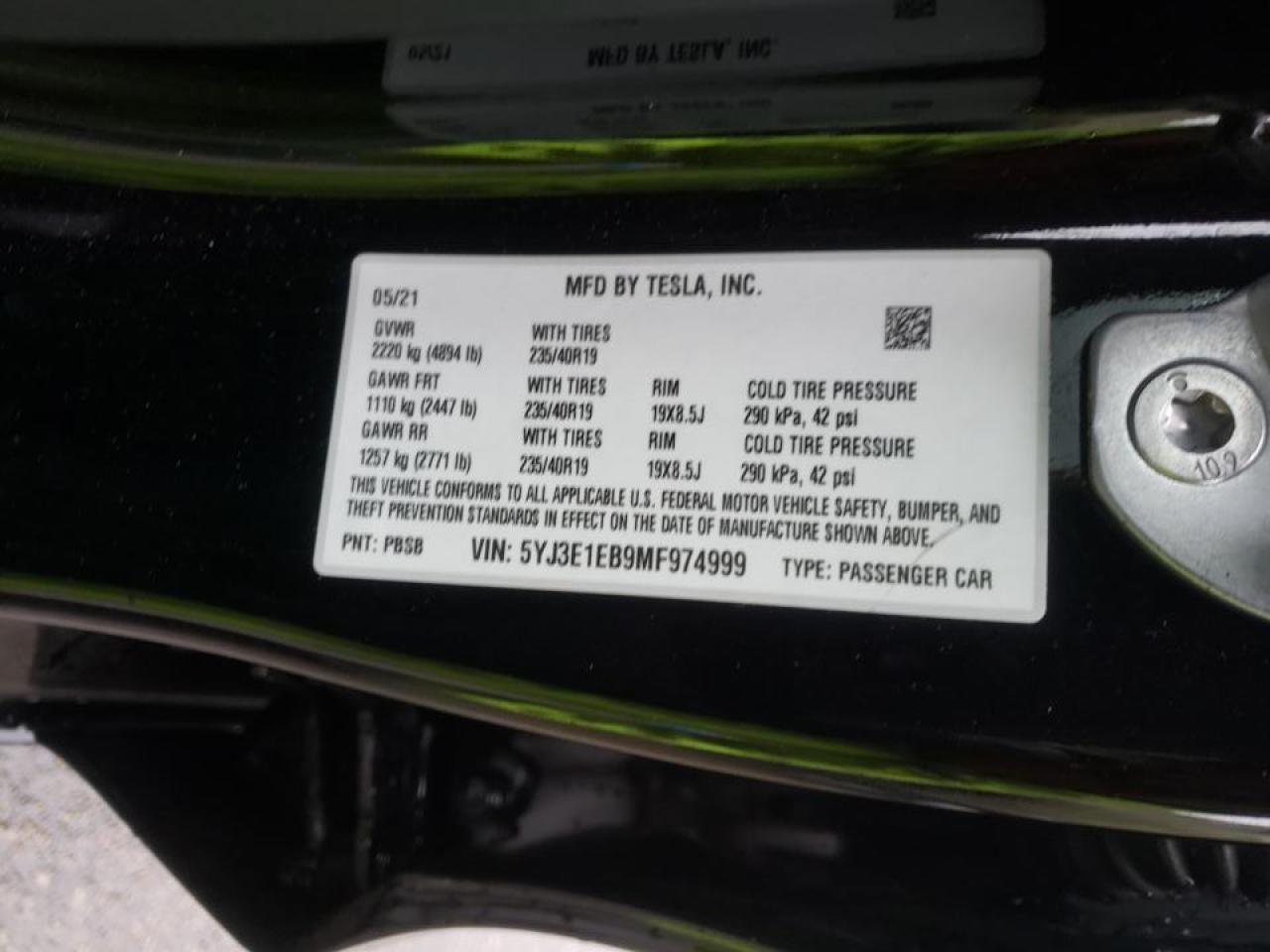 Photo 10 from auction – 2021 TESLA MODEL 3 with VIN 5YJ3E1EB9MF974999