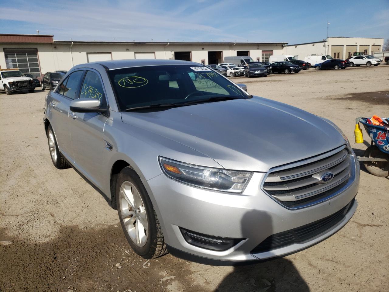 FORD TAURUS SEL 2015 with VIN 1FAHP2E80FG179851 - Photo from auction