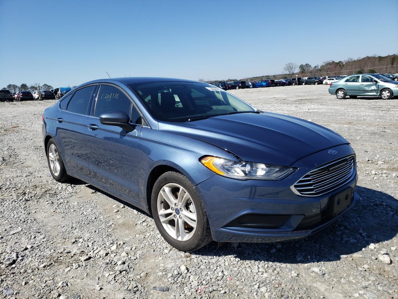FORD FUSION SE 2018 with VIN 3FA6P0HD5JR211022 - Photo from auction