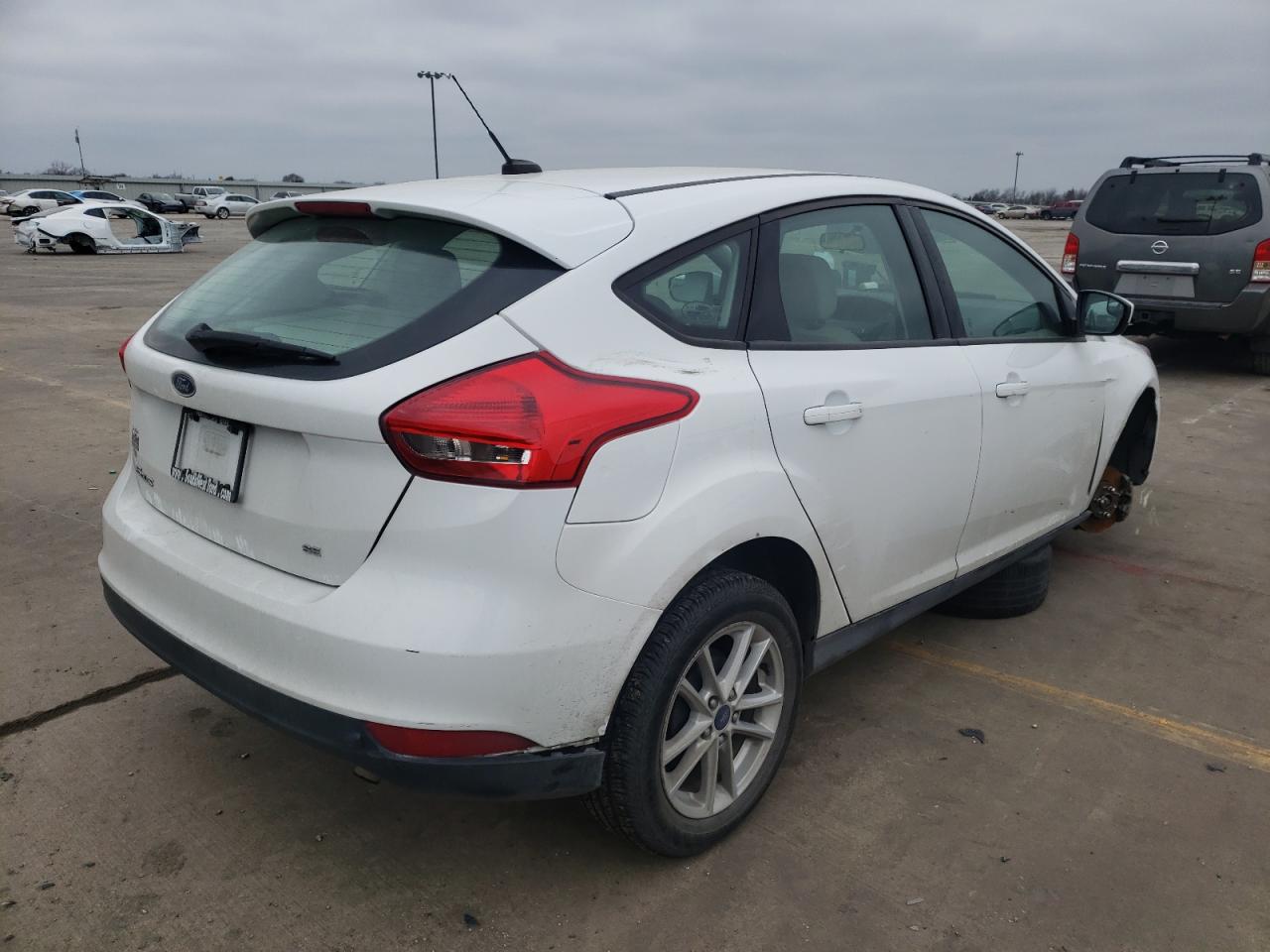Photo 4 from auction – 2018 FORD FOCUS SE with VIN 1FADP3K24JL325690