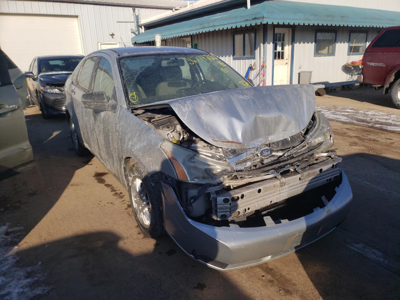 FORD FOCUS SE 2010 with VIN 1FAHP3FN3AW127011 - Photo from auction