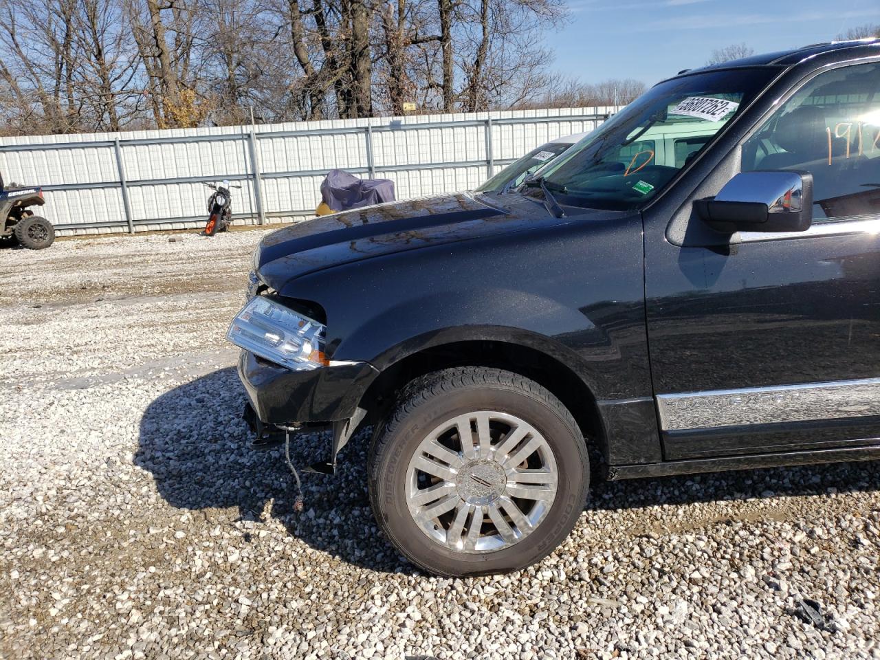 Photo 9 from auction – 2011 LINCOLN NAVIGATOR with VIN 5LMJJ2J53BEJ06769
