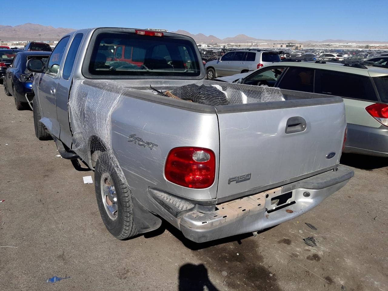 Photo 3 from auction – 2003 FORD F150 with VIN 1FTRX07283KD72303