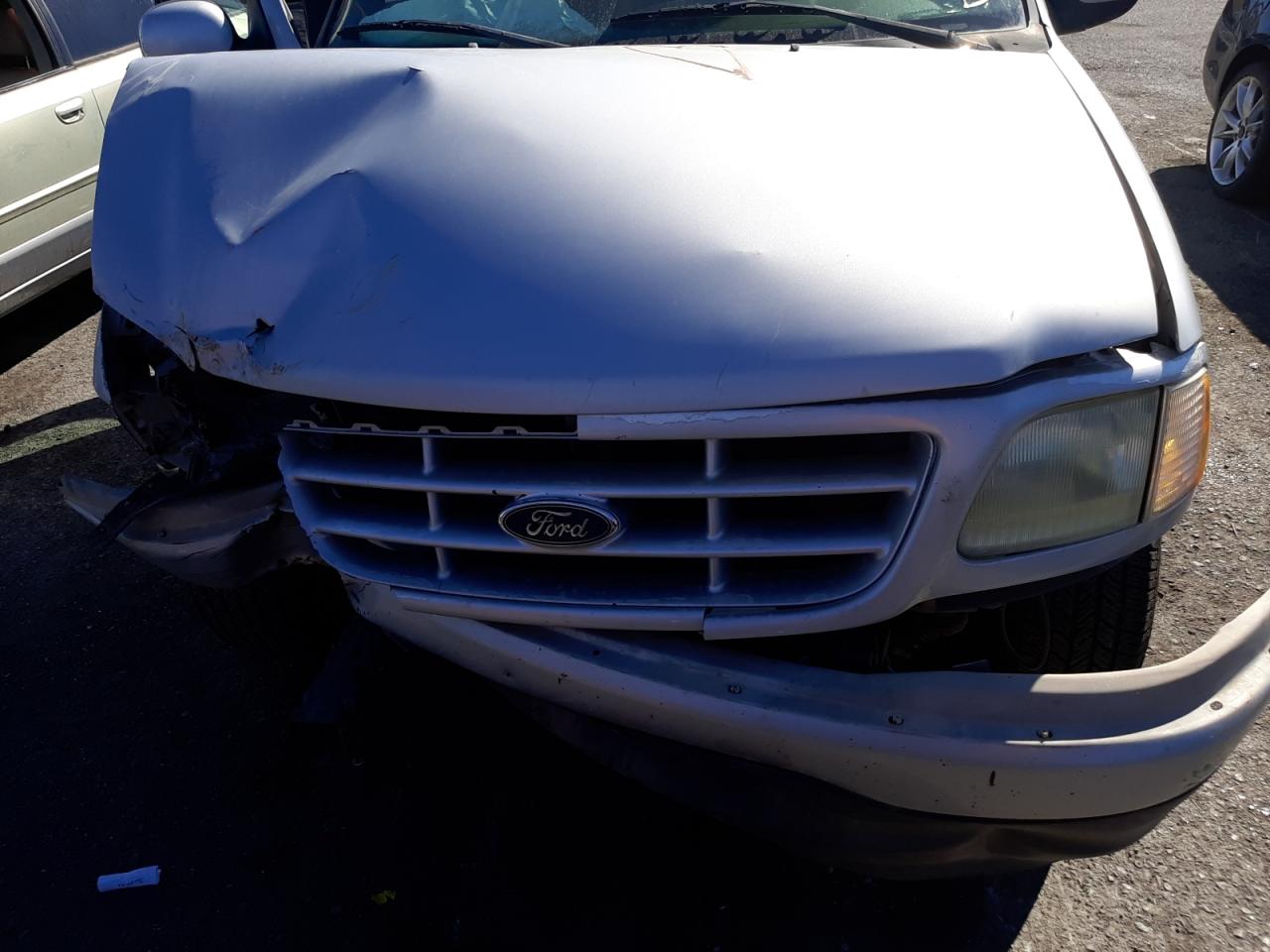 Photo 7 from auction – 2003 FORD F150 with VIN 1FTRX07283KD72303