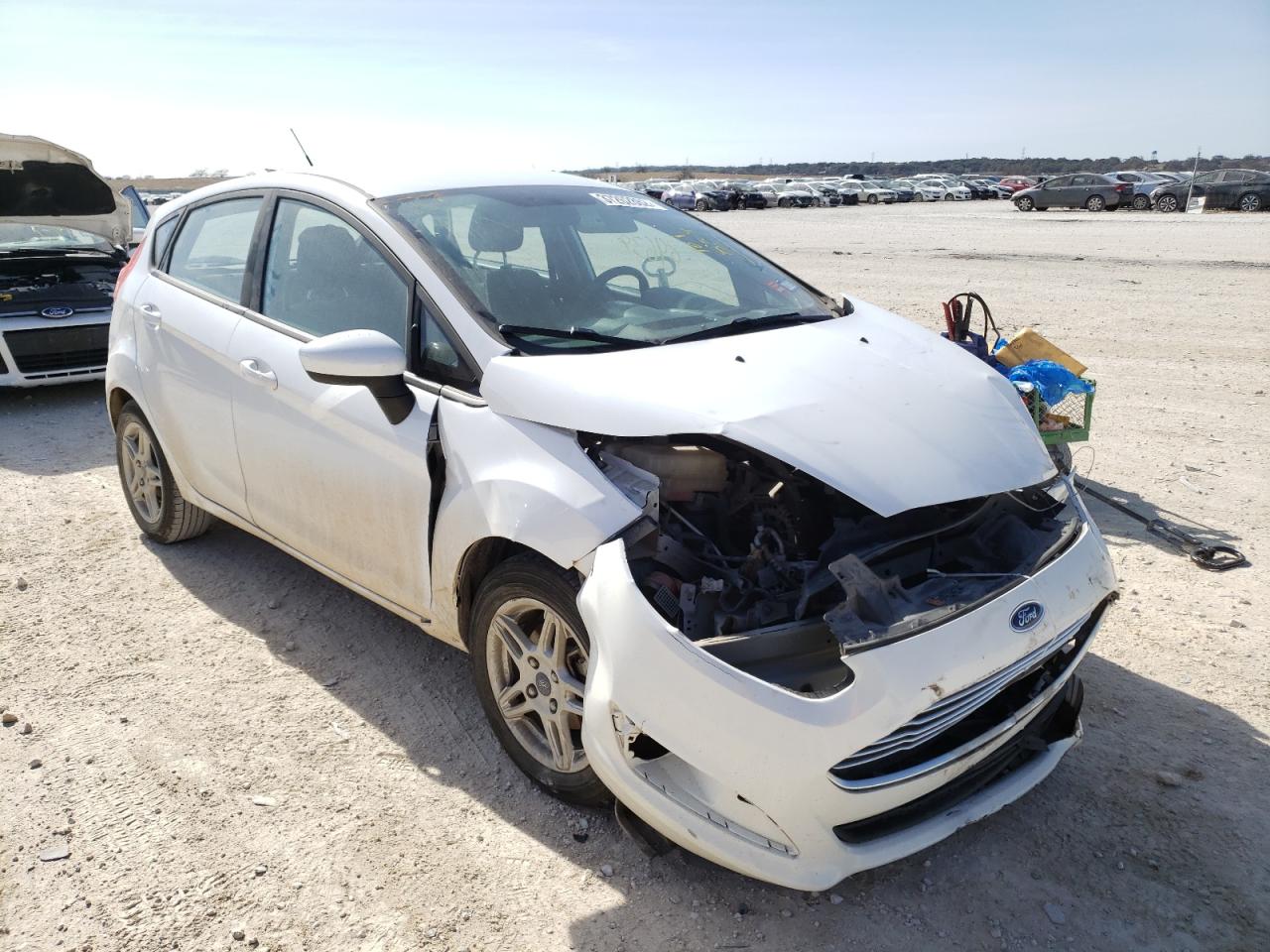 FORD FIESTA SE 2018 with VIN 3FADP4EJ5JM101853 - Photo from auction