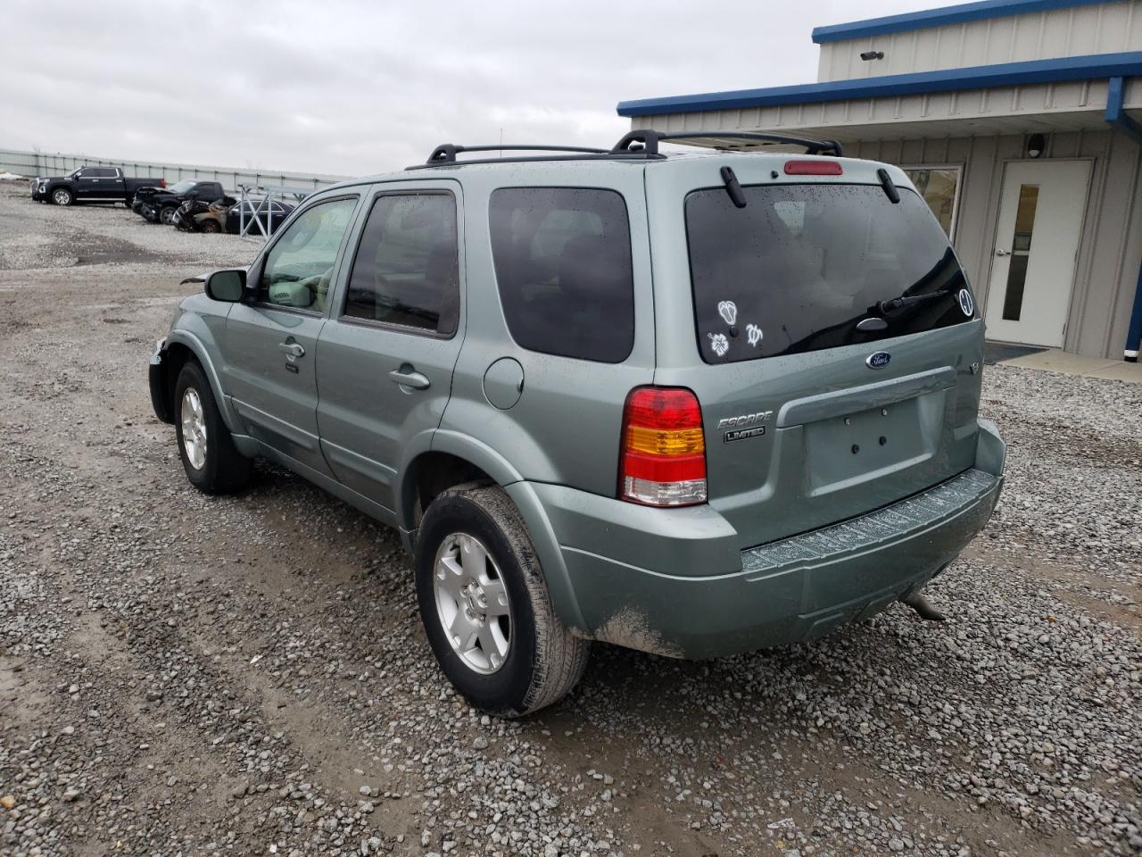 Photo 3 from auction – 2006 FORD ESCAPE LIM with VIN 1FMYU04166KC08497