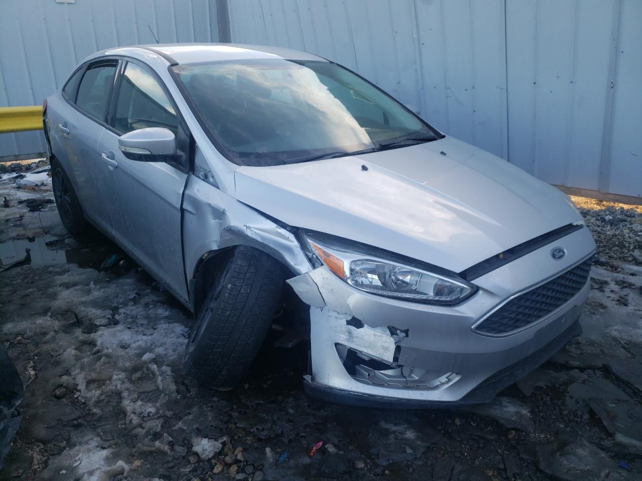 FORD FOCUS SE 2016 with VIN 1FADP3F24GL329628 - Photo from auction