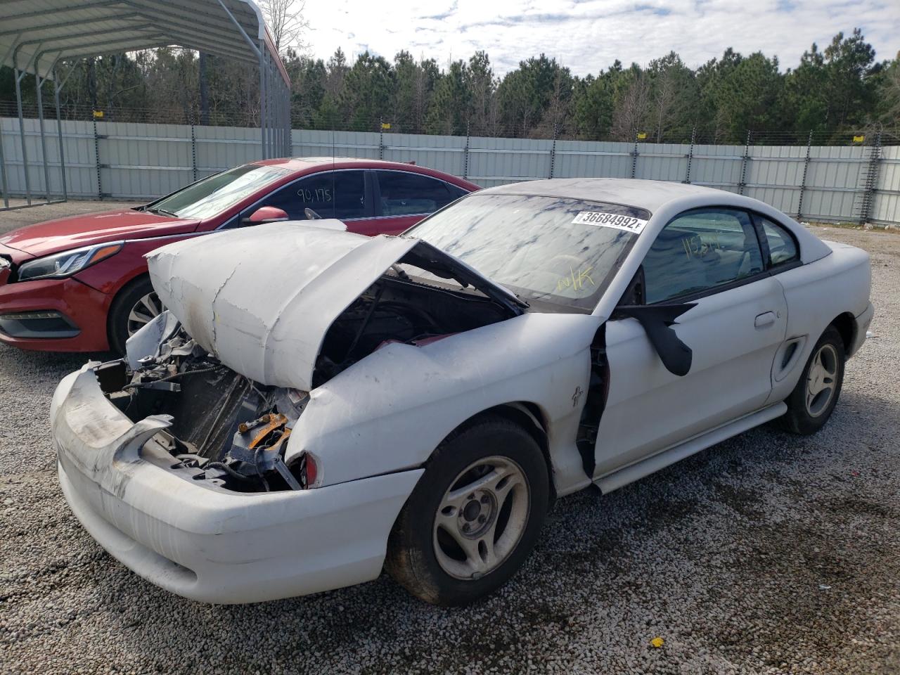 Photo 2 from auction – 1997 FORD MUSTANG with VIN 1FALP4049VF121526