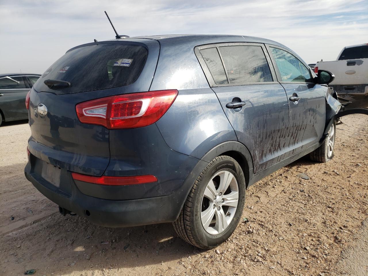 Photo 4 from auction – 2013 KIA SPORTAGE L with VIN KNDPBCA2XD7500593