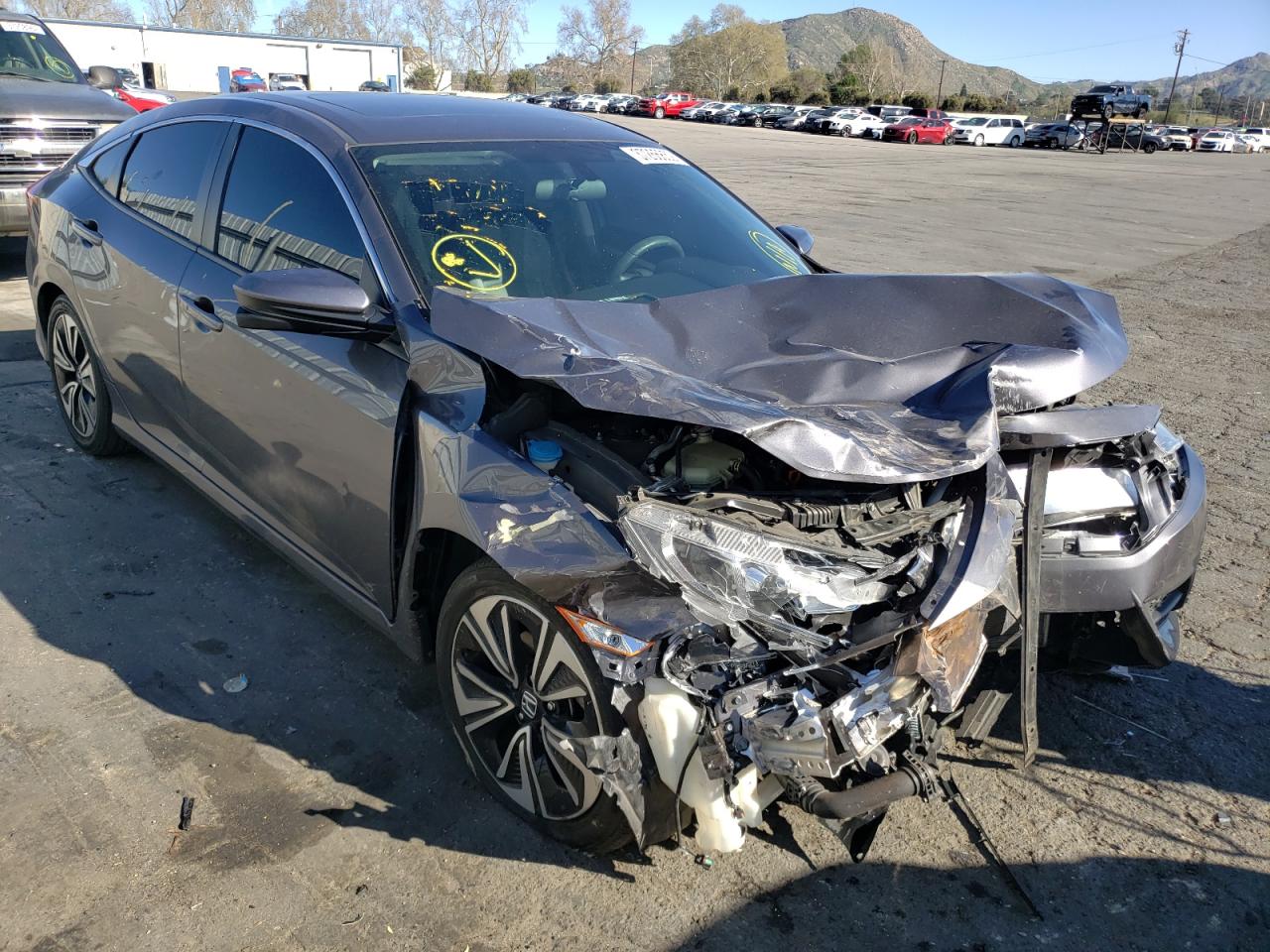 HONDA CIVIC EX 2016 with VIN 2HGFC1F35GH652595 - Photo from auction