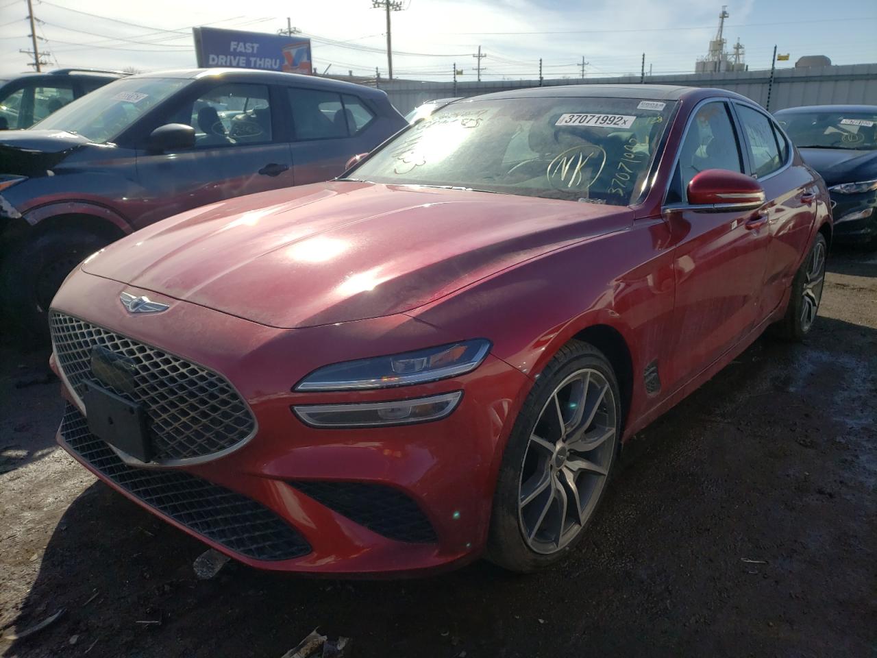 Photo 2 from auction – 2022 GENESIS G70 BASE with VIN KMTG34TAXNU088932